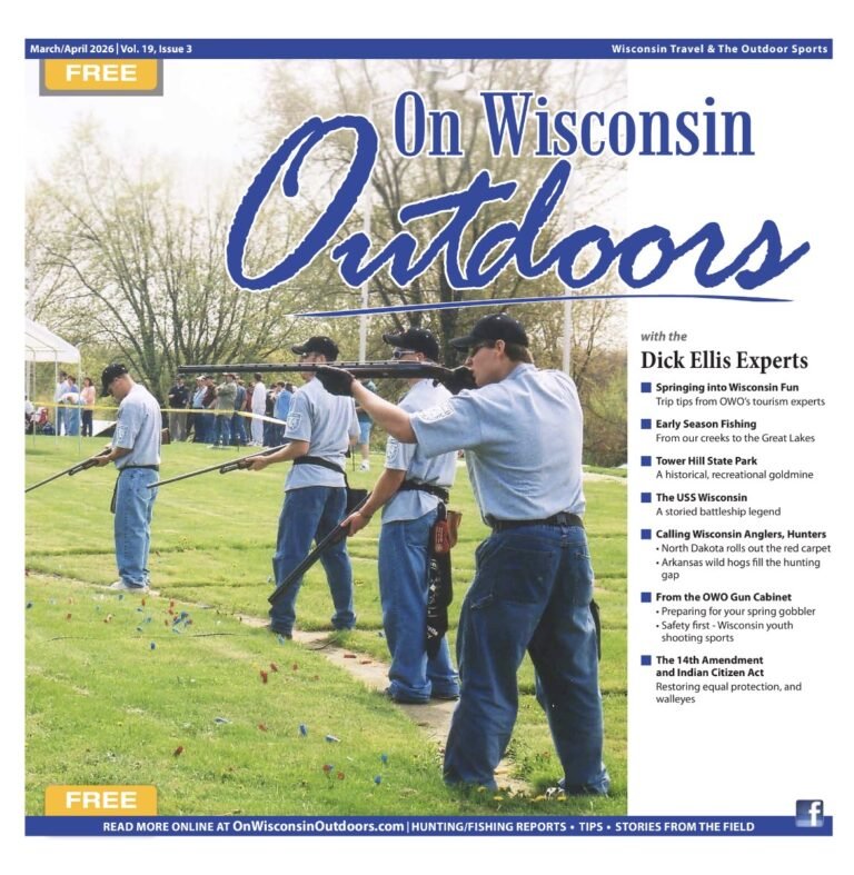 Cover image of On Wisconsin Outdoor, Vol. 19, Issue 3. Four Wisconsin youth sport shooters participate in a trap shooting competition on the trap range shooting shotguns in the daytime.
